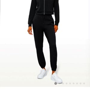 Women's black luxury "runway" joggers, L, cuts